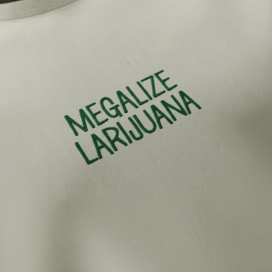 spankers weed tshirt Text 'MEGALIZE LARIJUANA' on a beige background