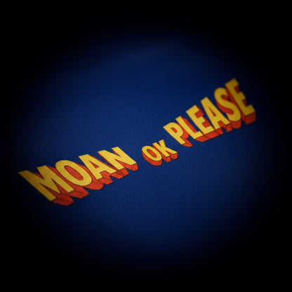 Text 'MOAN OK PLEASE' in yellow and red on a blue background ( blue tshirt , royal blue  tshirt , oversized , potter , moan ok please  tshirt , moan is music and horn is noise  , spankers , spankers india , tshirt , screen print , puff print ) 