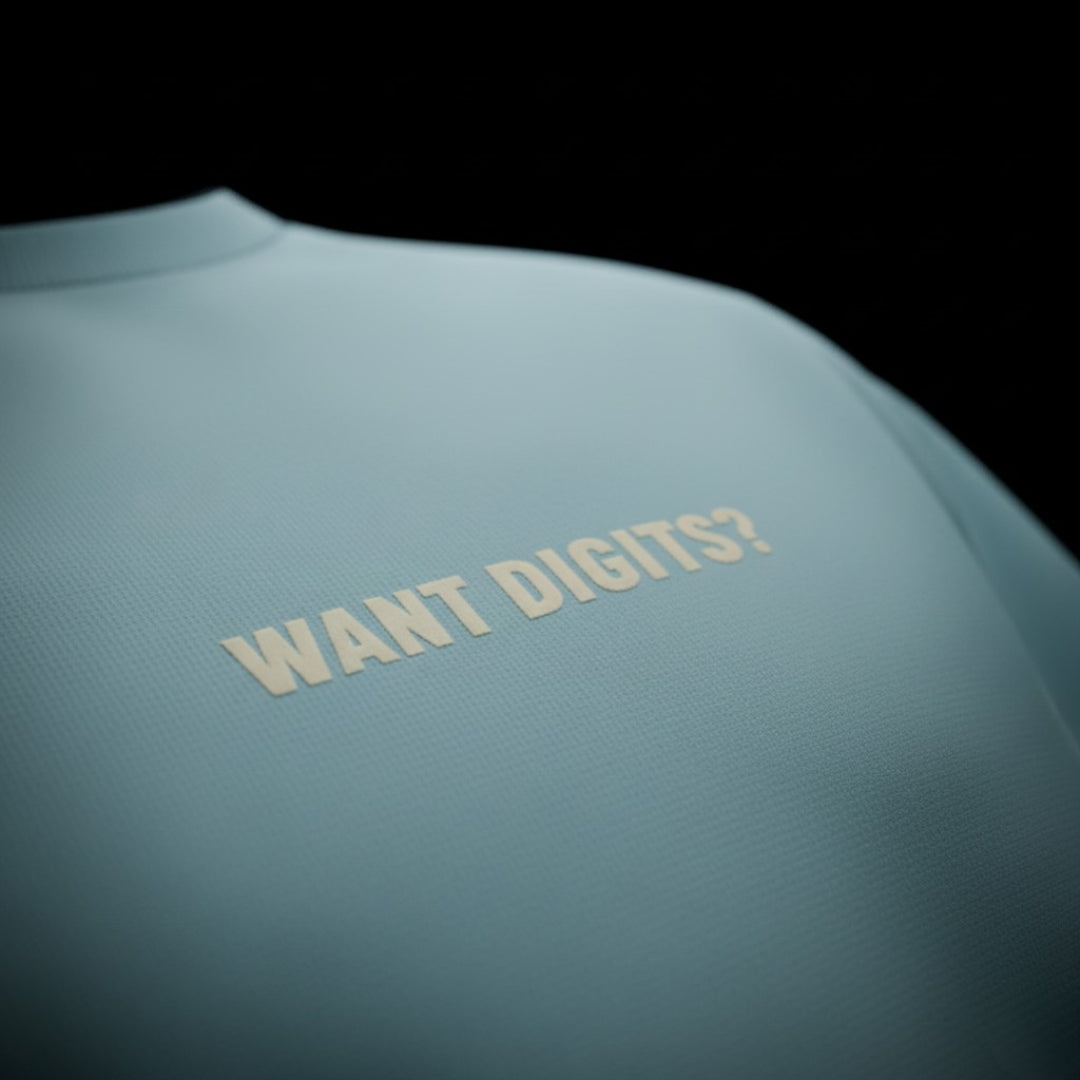 Teal shirt with 'WANT DIGITS?' text on a black background