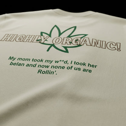 spankers weed tshirt Beige t-shirt with green text and leaf graphic on a black background