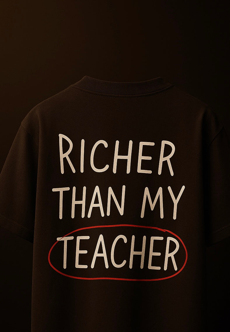 spankers brown t-shirt with 'Richer than my teacher' text on a dark background