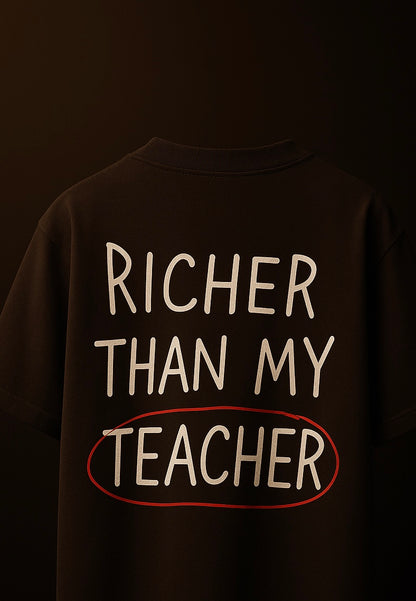 spankers brown t-shirt with 'Richer than my teacher' text on a dark background