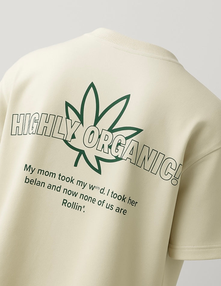 spankers weed tshirt Beige t-shirt with green leaf graphic and text on a plain background
