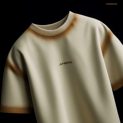 spankers spray Beige tshirt with 'SPNKRS' logo on a black background