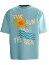 spankers Light blue t-shirt with sun and wave design on a white background