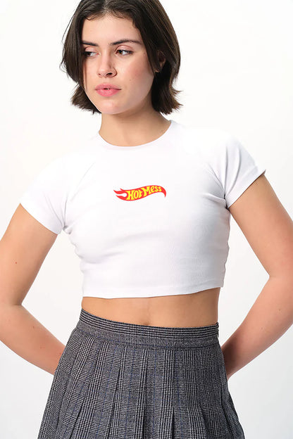 spankers Person wearing a white crop top with a red and yellow logo and a plaid skirt on a white background