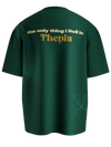spankers thepla Green t-shirt with text on the back on a white background , the only thing i roll is thepla 